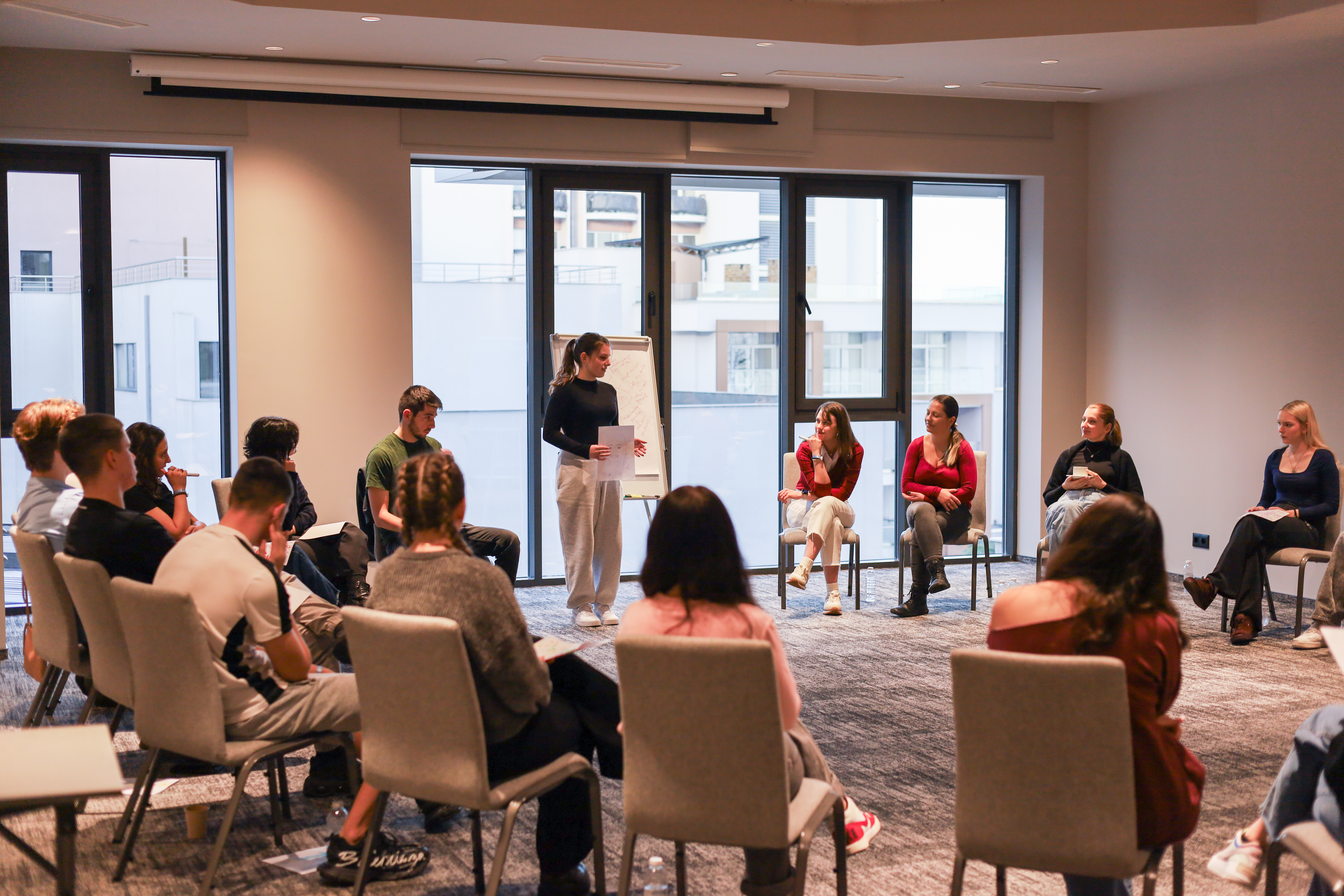 Colleagues collaborating in a meeting.